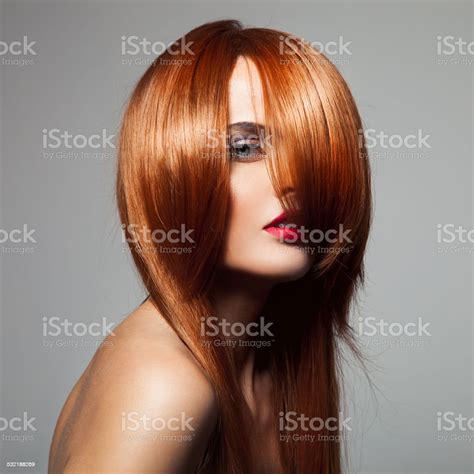 Beauty Model With Perfect Long Glossy Red Hair Closeup Portrai Stock