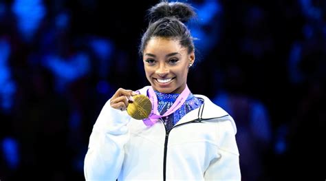 simone biles wins all around title at worlds to become history s most decorated gymnast