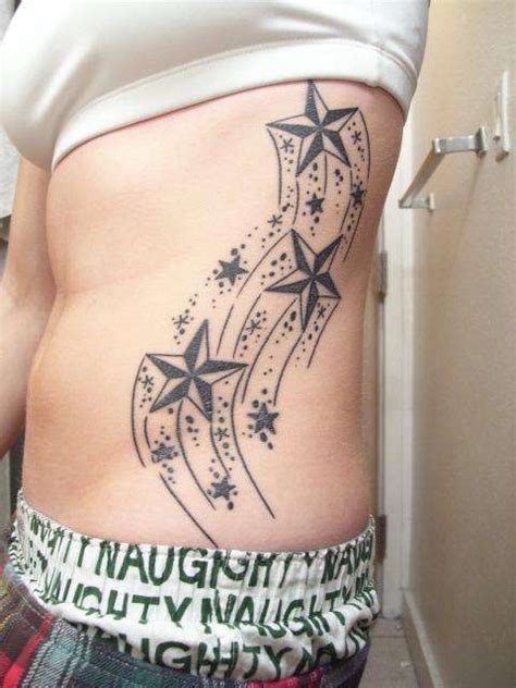 Rib tattoos for guys 32 magical collections design press. Star Tattoo Rib For Guys
