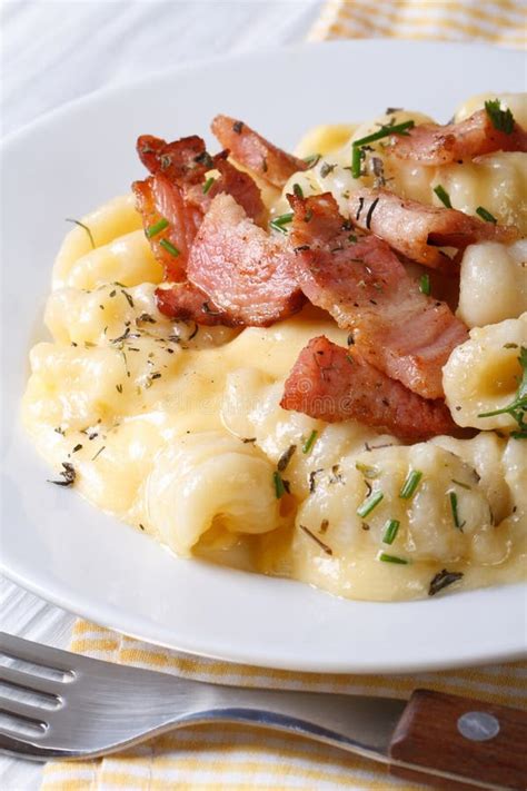 Potato Gnocchi With Cheese Sauce And Bacon Vertical Stock Image