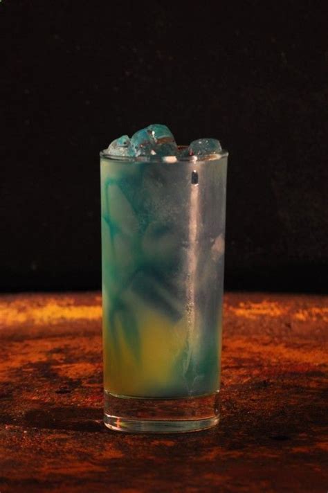Transport yourself to the tropics with a rum cocktail. Electric Smurf- with Malibu coconut rum, Blue Curacao ...