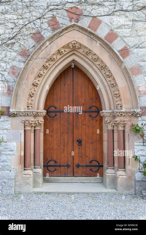 Old Gothic Arched Church Door With Ornate Stone Columns Stock Photo Alamy