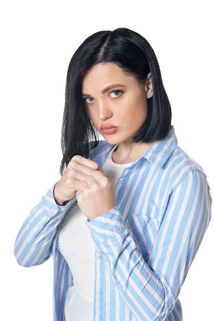 Premium Photo Portrait Of Aggressive Young Woman Showing Fists