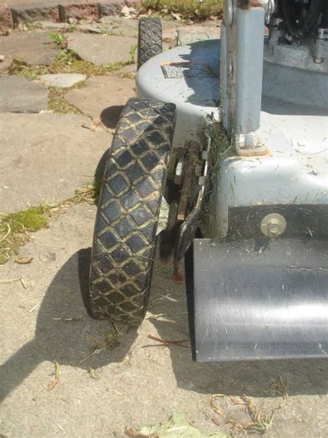Repairing a lawn, lawn care, lawn fertiliser, seeding a lawn and taking care of a lawn. Repair a Sagging or Broken Lawnmower Wheel: 4 Steps (with Pictures)