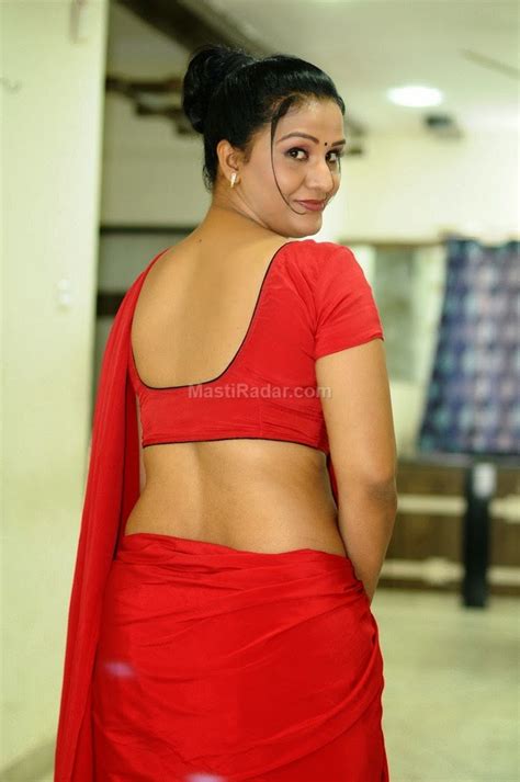 Apoorva Aunty Latest Spicy Hot Navel Show Stills In Red Saree