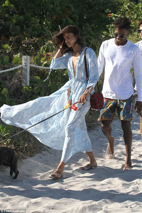 Shanina Shaik and shirtless fiancé DJ Ruckus share kiss on Miami Beach