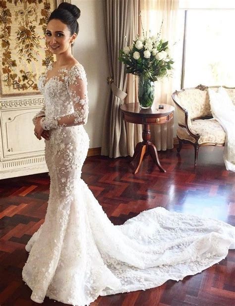 A classic gown that nods to one's unique style is the most reliable way to ensure you'll feel in your own skin on. Lace Mermaid Long Sleeves Jewel Chapel Train Appliques ...