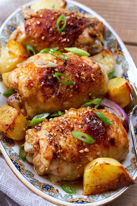 Place potatoes in a plastic bag with the oil, rosemary, and garlic. Baked Garlic Chicken and Potatoes — Eatwell101
