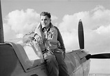 Lieutenant A Sachs SAAF seconded to No. 92 Squadron RAF sitting on his ...
