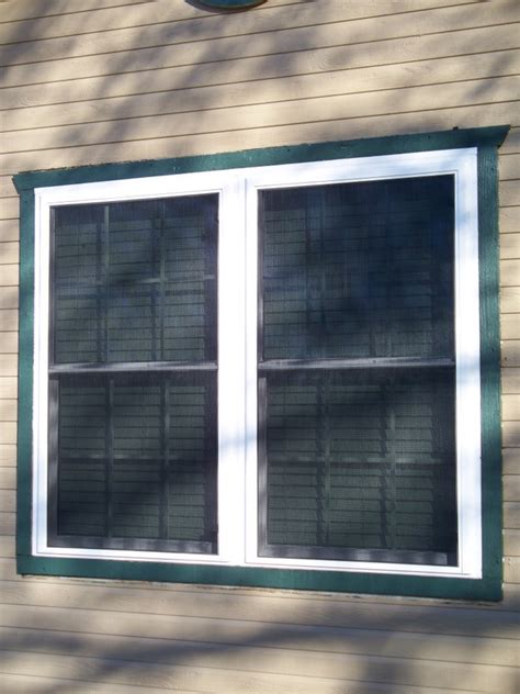 The inlet vent tabs screwed down into the underlying plywood strip and capturing the three layers of screen. Solar window screens in Longview and Tyler Texas