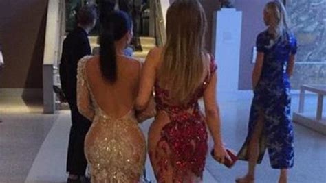 kim kardashian and jennifer lopez pose for booty photo for kanye west at met gala