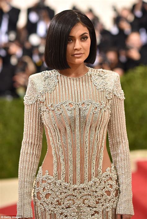 Kylie Jenner Forgoes Undergarments In Metallic See Through Gown At The Met Gala Daily Mail Online