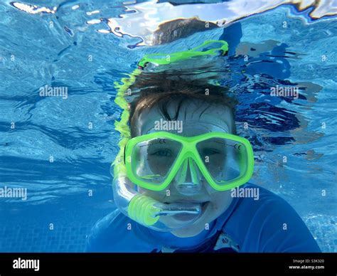 Young Boy Wearing A Snorkel And Mask Underwater Stock Photo Alamy