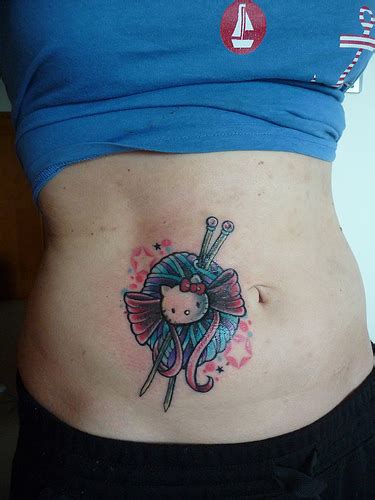 Cute Hello Kitty Yarn Tattoo On Stomach For Girls
