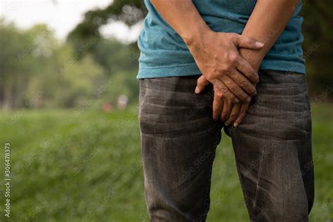 Asian Man Patient Hands Holding His Crotch With Prostate Problems Feel