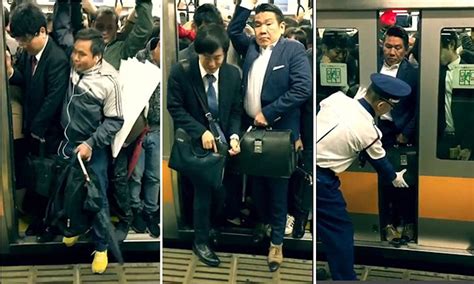 Tokyo Commuters Pack Into A Packed Rush Hour Train In Amazing Video