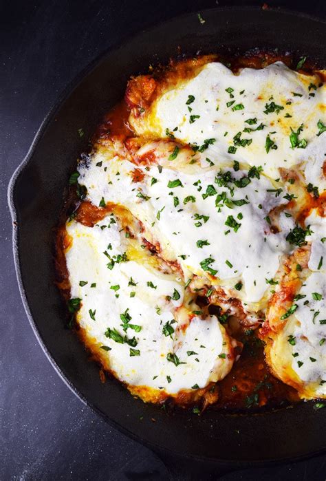 Chicken cutlets, breaded and fried, smothered with tomato sauce, and covered with mozzarella and parmesan cheeses are so good. One-Skillet Chicken Parmesan Recipe | Kitchen Swagger