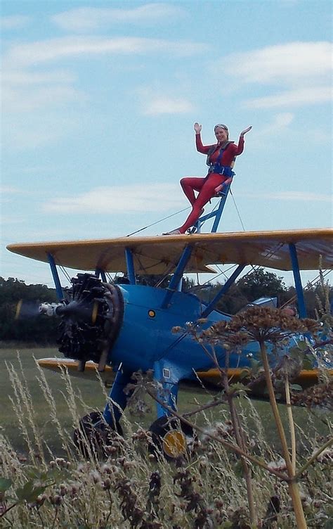Blue And Yellow Stearman Bi Plane With Red Suited Lady Win Flickr