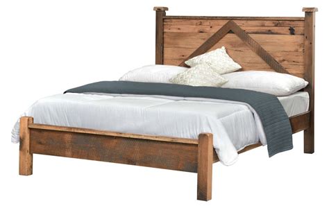 A Wooden Bed Frame With White Pillows And Blankets On Its Headboard