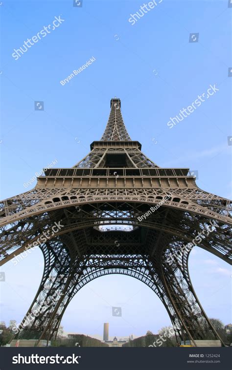 Wide Angle Portrait View From The Base Of The Eiffel Tower In Paris