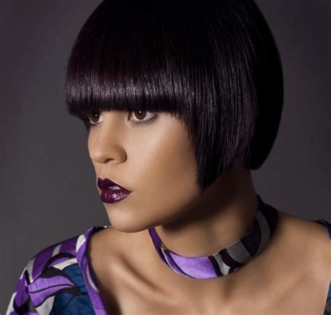 Jet black henna hair colo. Clean, straight and smooth bob for dark hair with a purple ...