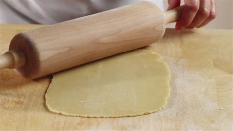 Rolling Out Shortbread Dough With A Rolling Pin Stock Footage Video