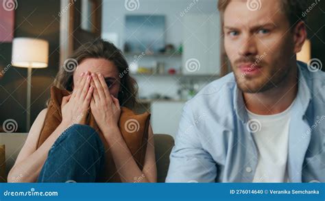 Frightened Woman Covering Face Watching Horror Home Pov Couple Staring Thriller Stock Footage