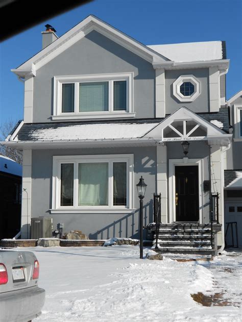 Dark Grey Stucco House With White Trim Sona Compton