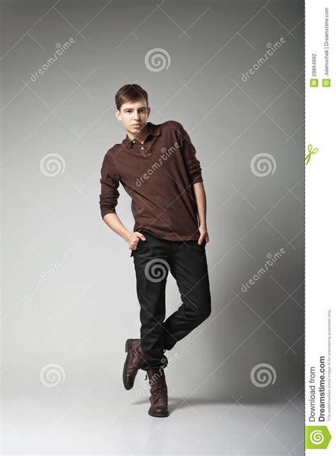 Young Male Fashion Model Posing In Casual Outfit Stock