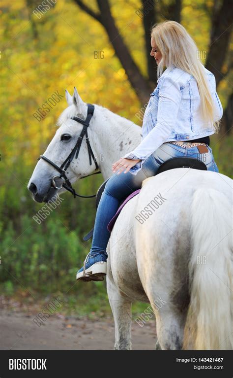 Blonde Riding Horse