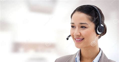 Customer Service Woman With Bright Background In Call Center Stock