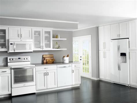 There are two colors with white and this kitchen looks very modern and cozy at the same time. 20 Modern Kitchen Designs With White Appliances - Housely