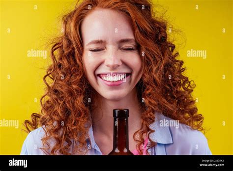 Redhaired Ginger Woman Holding Non Alcoholic Alcohol Wine Bottle And Feeling Good Emotions Stock