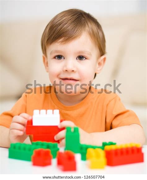 Cute Little Boy Playing Building Blocks Stock Photo 126507704