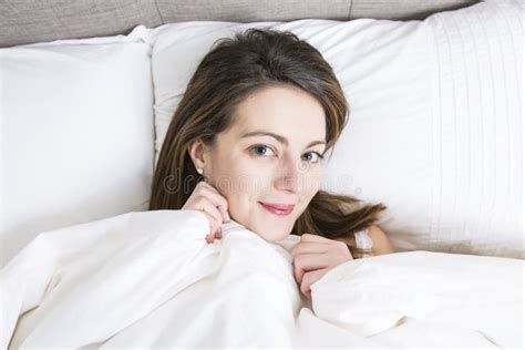 Young Sleeping Woman In Bedroom At Home Wearing In White Stock Image Image Of Caucasian Sheet