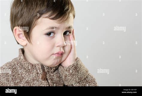 Portrait Of A Sad Little Boy Stock Photo Alamy