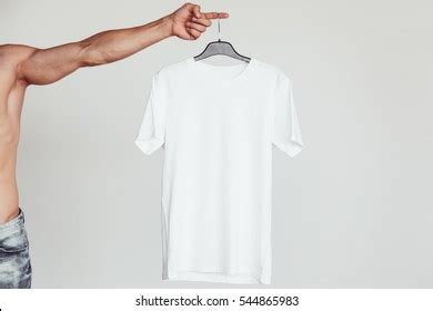 Man Holding Tshirt Images Stock Photos D Objects Vectors