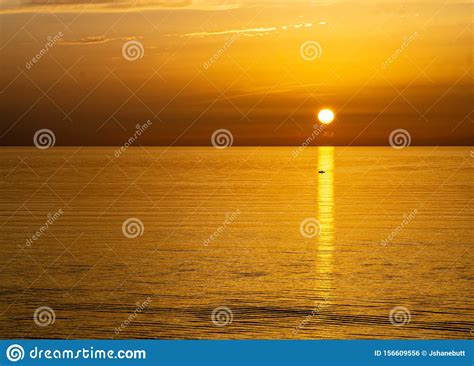 Sunrise Over The Ocean Stock Photo Image Of Mindful 156609556