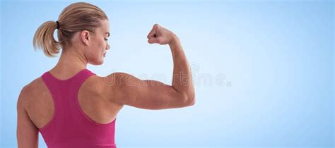 Composite Image Of Rear View Of Muscular Woman Flexing Muscles Stock