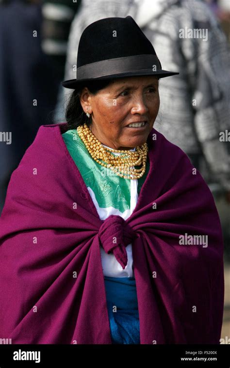 Indigenous Woman Wearing Traditional Dress At Otavalo Market Ecuador
