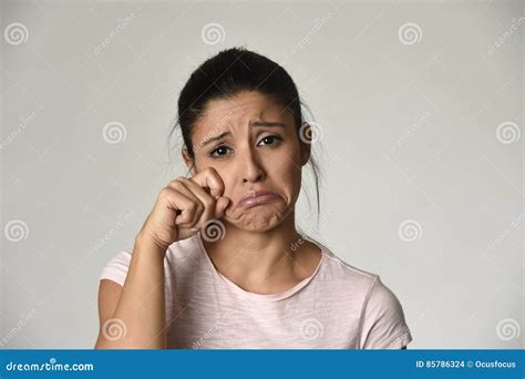 Latin Sad Woman Serious And Concerned Crying Desperate Overacting On
