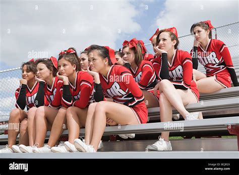 Cheerleaders On Bleachers Stock Photo Alamy