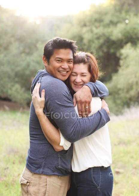 Couple Hugging Each Other In Field — Rural Scene Togetherness Stock
