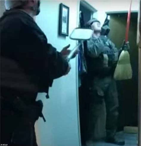 shocking moment swat team breaks into 77 year old grandma s home daily mail online