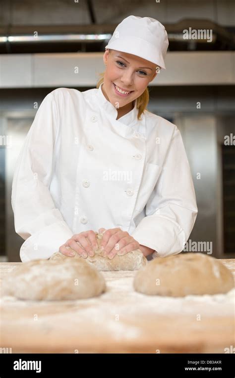Baker Kneading Bread Dough In Bakehouse Of Bakery Stock Photo Alamy