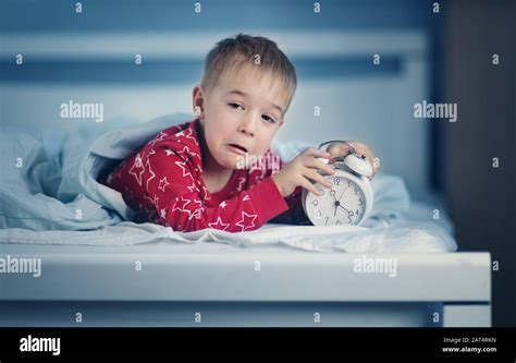Worried Child In Bed Hi Res Stock Photography And Images Alamy