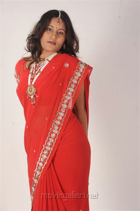 Actress Mahathi Hot Red Saree Photo Shoot Stills