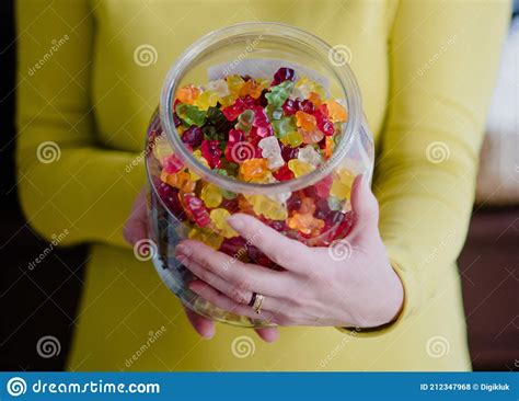 Woman Offers Gummy Bears From Glass Jar Editorial Stock Photo Image