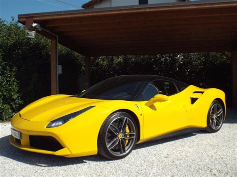 ferˈraːri) is an italian luxury sports car manufacturer based in maranello, italy. Ferrari 488 GTB Yellow - Luxury Garage Service