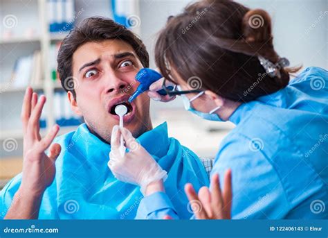 The Patient Afraid Of Dentist During Doctor Visit Stock Image Image